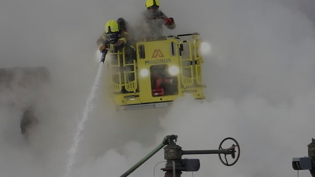 Firefighters extinguish fire at the North Hyde electrical substation (AP Image)