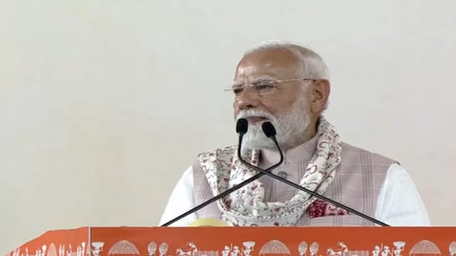 PM Modi addresses women at an event in in the Navsari district of Gujarat.