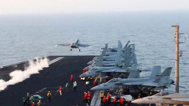 This image taken from video provided by the US Navy shows an aircraft launching from the USS Harry S. Truman in the Red Sea before airstrikes in Sanaa, Yemen, Saturday, March 15, 2025. (US Navy via AP)