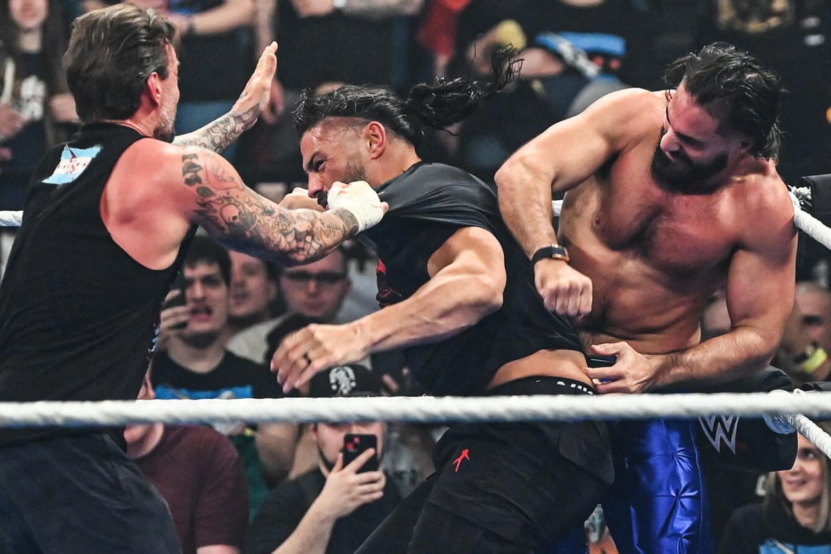 WWE SmackDown Results: Roman Reigns, CM Punk And Seth Rollins Brawl; Kevin Owens, Randy Orton Book WrestleMania Match