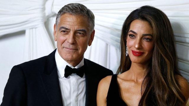 US actor George Clooney (L) and his wife Lebanese-British barrister Amal Clooney. (AFP file photo)