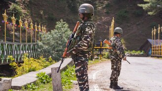 Security personnel stand guard a day after a terrorist attack in Pahalgam, J&K, Wednesday morning, April 23, 2025. (PTI Photo) Security personnel stand guard a day after a terrorist attack in Pahalgam, J&K, Wednesday morning, April 23, 2025. (PTI Photo)
