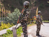 Security personnel stand guard a day after a terrorist attack in Pahalgam, J & K, Wednesday morning, April 23, 2025. (PTI Photo)