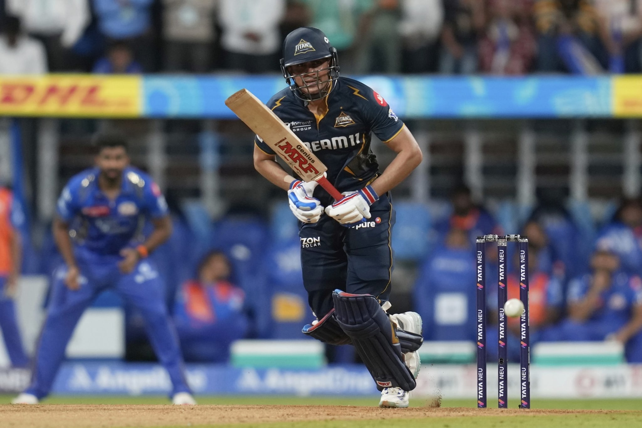 Shubman Gill, despite playing very slow, anchored GT's chase to put them firmly in front of the DLS par score through the initial stages of the second innings. (Image: AP) Shubman Gill, despite playing very slow, anchored GT's chase to put them firmly in front of the DLS par score through the initial stages of the second innings. (Image: AP)
