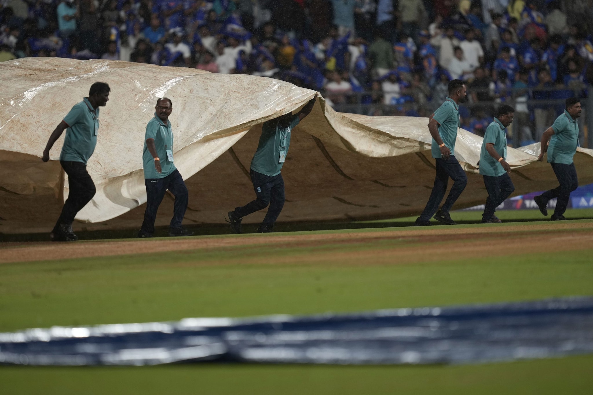 Rain played spoilsport for the second time after the 18th over of the second innings as well where MI were in front. (Image: AP) Rain played spoilsport for the second time after the 18th over of the second innings as well where MI were in front. (Image: AP)
