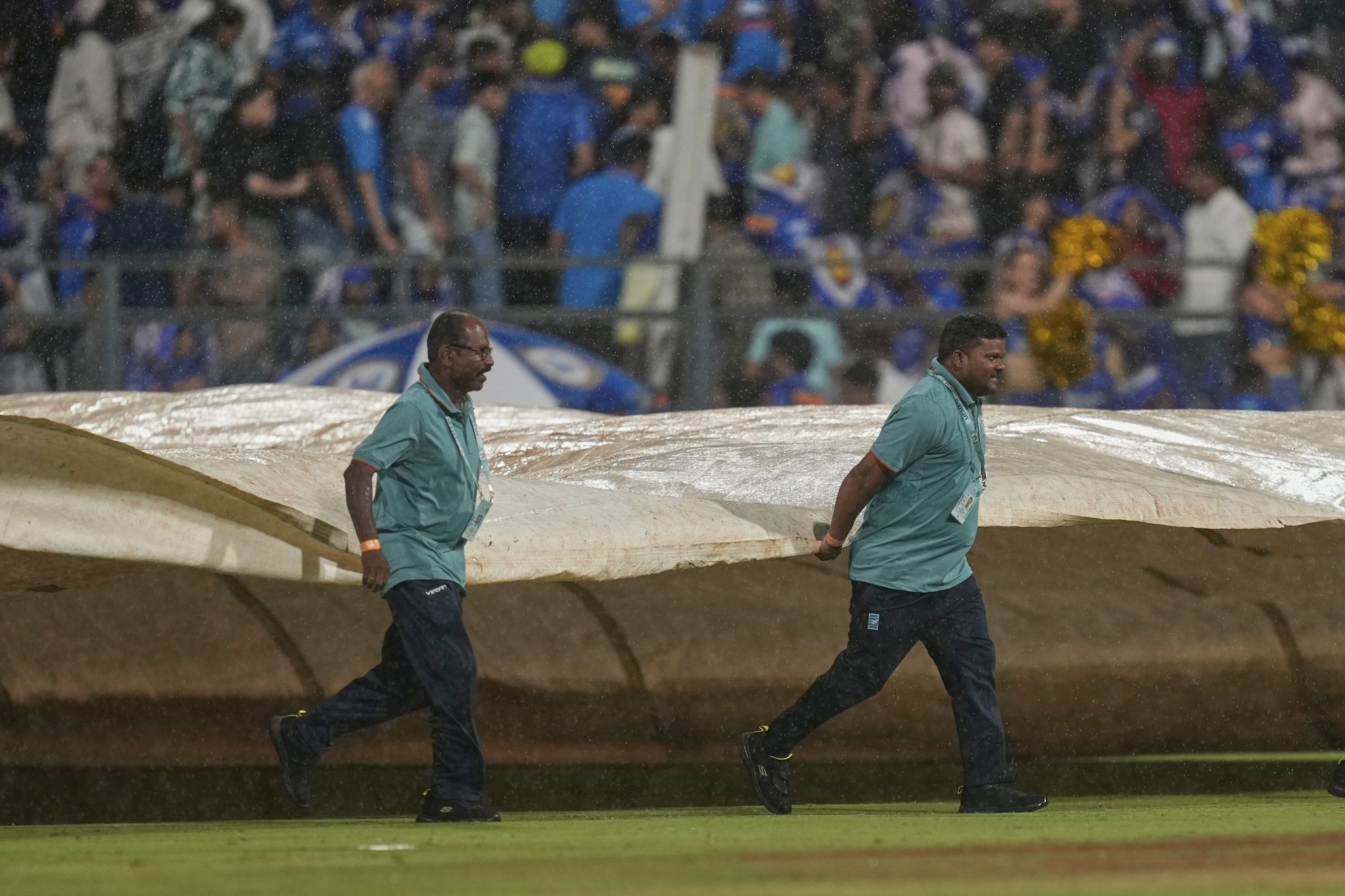 Rain interrupted the 2nd innings for the first time after the 14th over. (Image: AP) Rain interrupted the 2nd innings for the first time after the 14th over. (Image: AP)