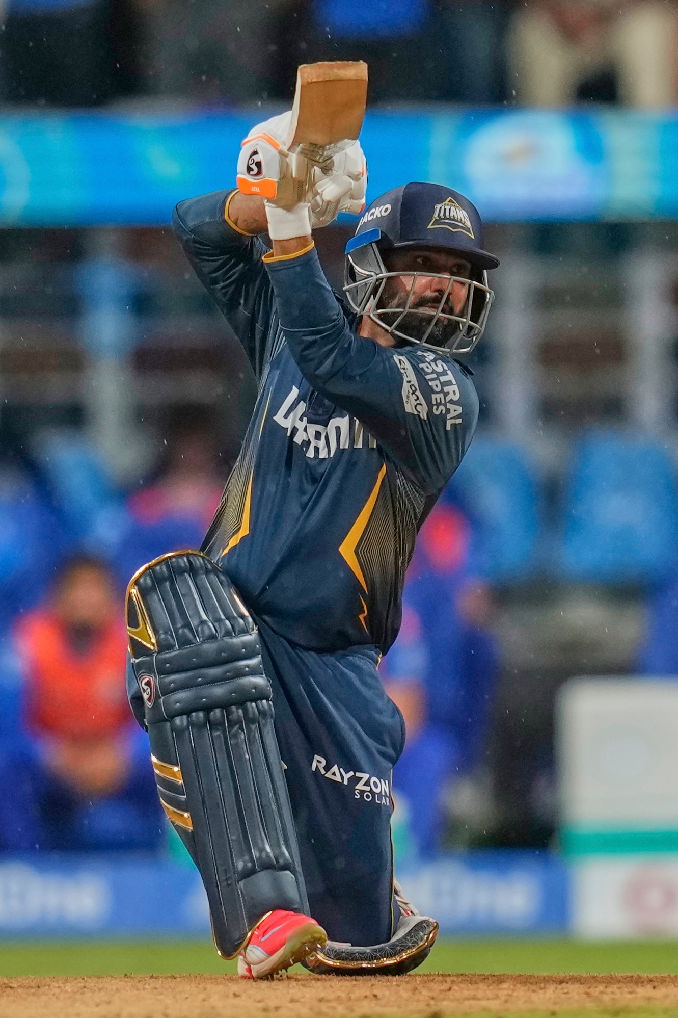 Rahul Tewatia smacked a boundary to start off the final over where GT needed 15 in the final over. (Image: AP) Rahul Tewatia smacked a boundary to start off the final over where GT needed 15 in the final over. (Image: AP)