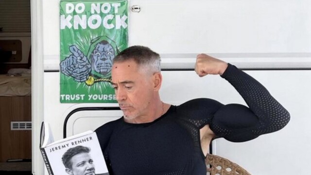 Sharp-eyed fans spotted a Dr. Doom poster lurking successful  the inheritance  of RDJ's pic.








