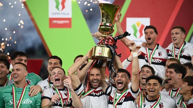 Bologna celebrating their Coppa Italia triumph   (AFP)