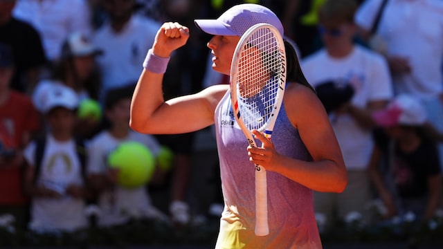 Iga Swiatek reacts after winning a point against Jaqueline Cristian. (AP Photo)