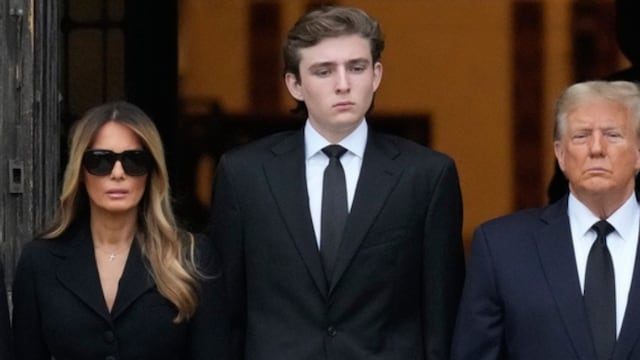 US President Donald Trump with his wife Melania Trump and son Barron. 