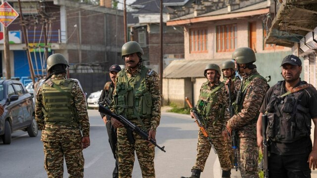 Security personnel keep vigil amid high alert after India struck nine terror targets in Pakistan & PoK, at Pampore in Pulwama district, J&K, on May 7, 2025. (PTI Photo)