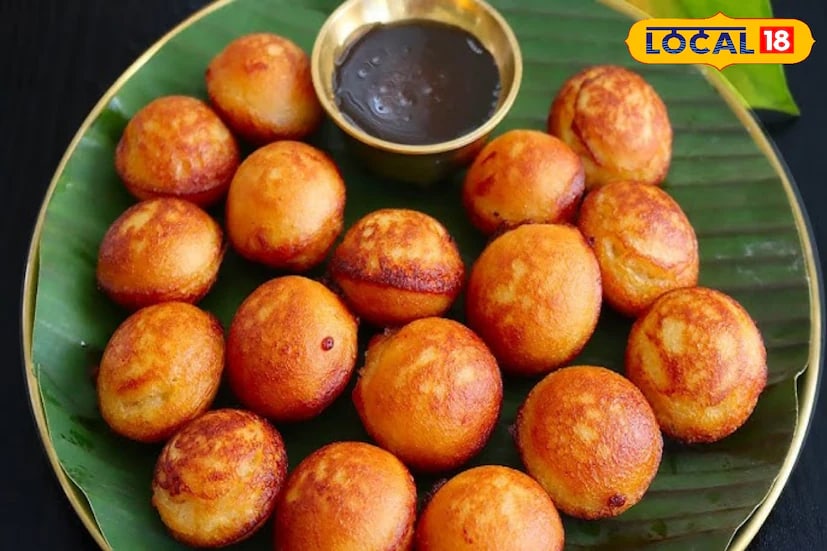 Next, add chopped onions, green chillies, ginger, grated carrot, and coriander to the batter. Heat the paniyaram pan, drizzle a little oil in each mould, and pour in the batter. Cook until the appe turn golden brown on all sides. (News18 Tamil) Next, add chopped onions, green chillies, ginger, grated carrot, and coriander to the batter. Heat the paniyaram pan, drizzle a little oil in each mould, and pour in the batter. Cook until the appe turn golden brown on all sides. (News18 Tamil)