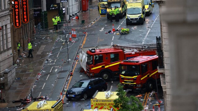 Emergency services at the scene after multiple people were hit by a car during the Victory parade in Liverpool. (Reuters)
