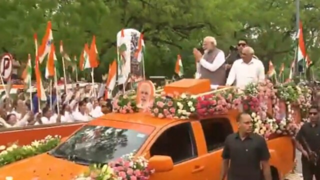 Screengrab of Prime Minister Narendra Modi's roadshow in Gandhinagar.  
