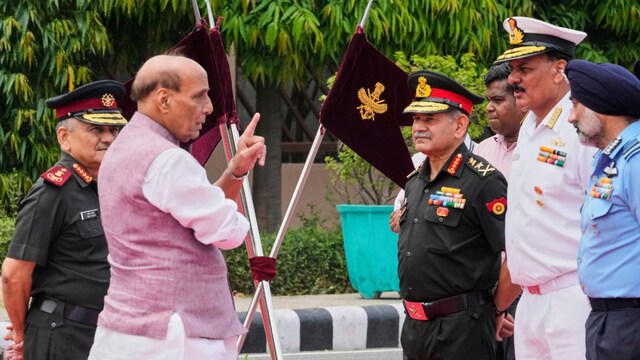 Defence Minister Rajnath Singh (second from left), talks to three Indian defence chiefs and Chief of Defence Staff on May 5. (AP) 