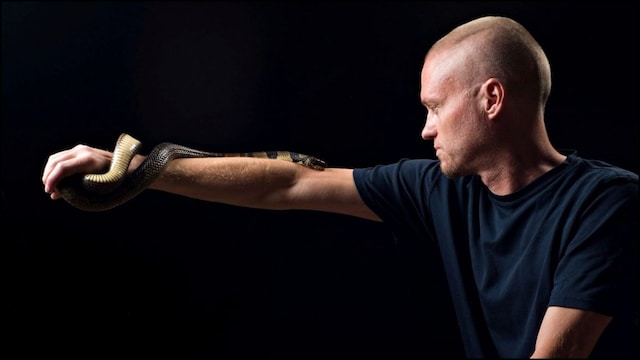 Tim Friede is hyper-immune to the venom of various snakes following his practice. (AP)