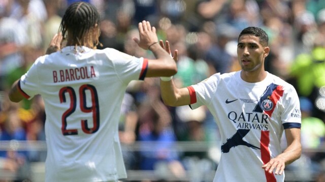 Paris Saint-Germain's Moroccan defender #02 Achraf Hakimi (R) celebrates scoring his team's second goal (AFP)