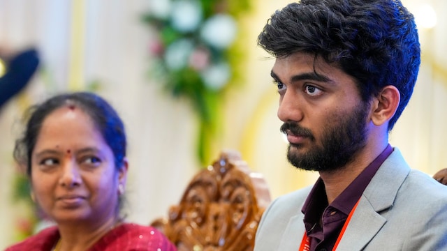 D Gukesh with his mother Padmakumari (PTI)