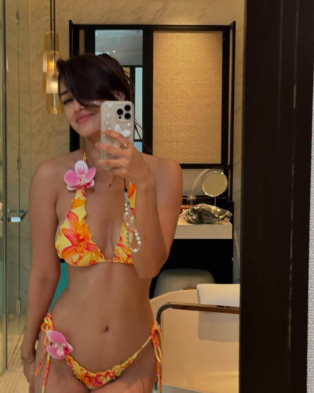 Her floral print bikini mirror selfie is a vision of summer glam. (Image: Instagram) Her floral print bikini mirror selfie is a vision of summer glam. (Image: Instagram)