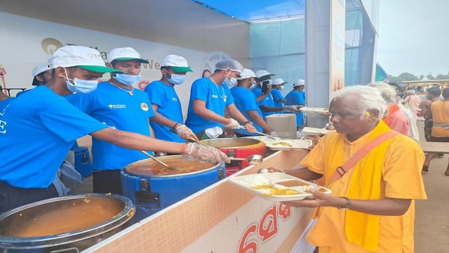 Food being served to devotees as part of Reliance Foundation’s Anna Seva initiative in Puri. Pic/News18