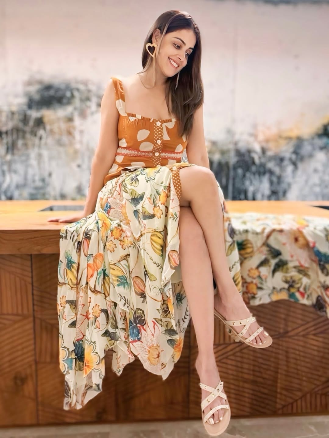 High-Slit Floral Skirt & Sleeveless Top: For a breezy, summer-perfect outfit, take notes from Genelia D’Souza’s wardrobe with a high-slit floral print skirt paired with a sleeveless top. The floral prints keep the vibe fresh and playful, while the slit adds a touch of boldness. Elevate your look with strappy flats or wedge sandals. (Image: Instagram) High-Slit Floral Skirt & Sleeveless Top: For a breezy, summer-perfect outfit, take notes from Genelia D’Souza’s wardrobe with a high-slit floral print skirt paired with a sleeveless top. The floral prints keep the vibe fresh and playful, while the slit adds a touch of boldness. Elevate your look with strappy flats or wedge sandals. (Image: Instagram)