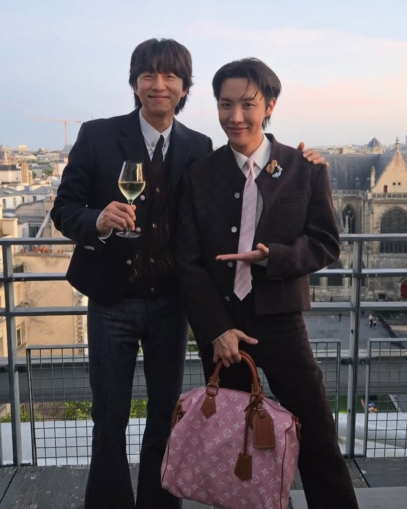Louis Vuitton ambassadors BTS J Hope and Squid Game fame Gong Yoo posed for a picture and were all smiles. (Image: Instagram) Louis Vuitton ambassadors BTS J Hope and Squid Game fame Gong Yoo posed for a picture and were all smiles. (Image: Instagram)