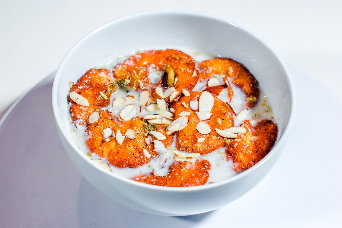 Rasabali: Rasabali is a rich, sweet delicacy made from pressed cottage cheese, deep-fried until it turns a lovely reddish-brown. This divine treat is best savoured at the Jagannath Temple, where it is a popular offering. (Representative image: Shutterstock)