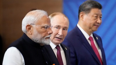 Prime Minister Narendra Modi, Russian President Vladimir Putin and Chinese President Xi Jinping. (Alexander Zemlianichenko/Pool via REUTERS)
