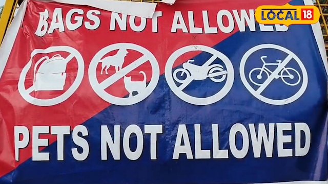 Security personnel at the entrance immediately stop visitors carrying prohibited items and inform them that no storage options are available. (Local18)