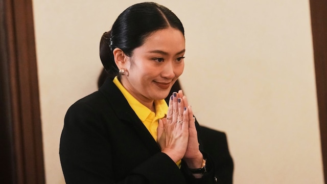 Thailand's Prime Minister Paetongtarn Shinawatra arrives to talk to reporters at Government house in Bangkok, Thailand, Thursday, June 19, 2025. (AP Photo)