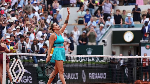 Aryna Sabalenka of Belarus celebrates beating Amanda Anisimova of the U.S. during their fourth round match of the French Tennis Open, at the Roland-Garros stadium, in Paris, Sunday, June 1 2025. (AP Photo/Lindsey Wasson)


