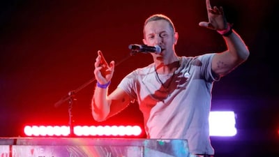 Chris Martin faces criticism from Yaron Samid over comments on Israelis and Palestinians.