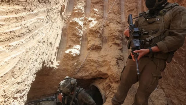 Israeli soldiers walk out from a tunnel underneath a hospital in Khan Younis at the Gaza Strip. (Reuters)