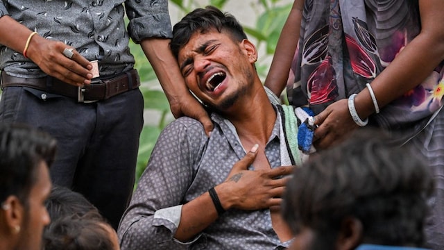 Kalpesh Patni mourns the death of his 15-year-old brother Akash Patni. (AFP)