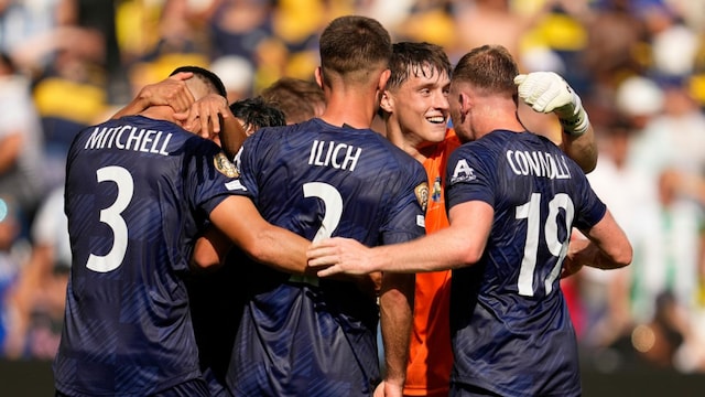 Auckland City celebrate after the match. (AP Photo)