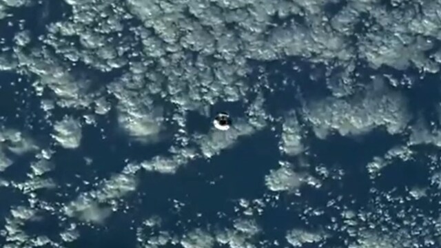 Dragon spacecraft seen from  Space Station.