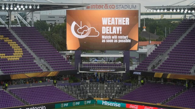 Club World Cup Group C match between Benfica and Auckland City in Orlando delayed by weather. (AP Photo)