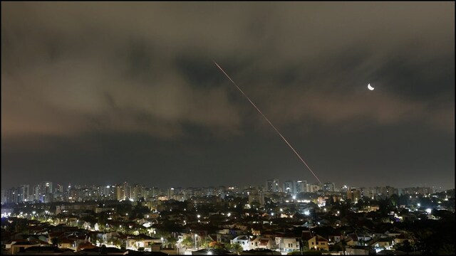 A missile launched from Iran is intercepted as seen from Ashkelon. (Reuters)