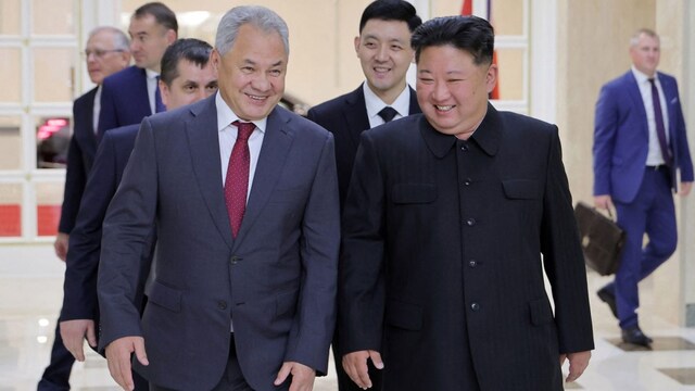 North Korea's leader Kim Jong Un (R) meeting with Russian Security Council Secretary Sergei Shoigu (L) on June 17. (AFP)