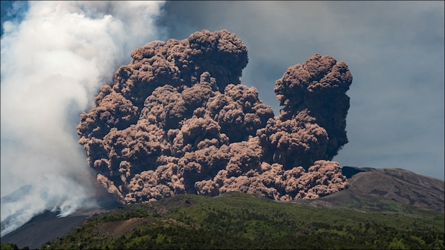 Volcanic steam rises from Mount Etna (Reuters)