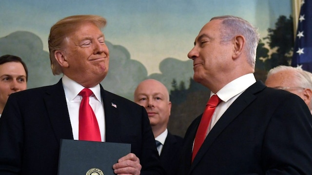 In this March 25, 2019 file photo, President Donald Trump smiles at Israeli Prime Minister Benjamin Netanyahu (right) after signing a proclamation at the White House in Washington. (AP File)