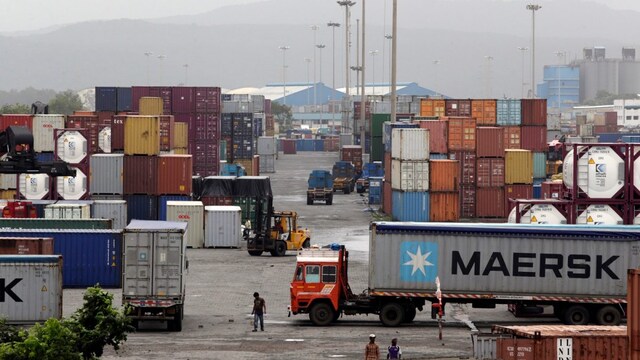 Containers are piled up at a terminal at the Jawaharlal Nehru Port Trust in Mumbai. (AP file photo)