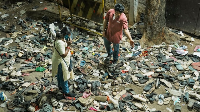 Footwear outside the Chinnaswamy Stadium following a stampede after a large number of fans gathered for the felicitation of IPL 2025 winning Royal Challengers Bengaluru team. (PTI)