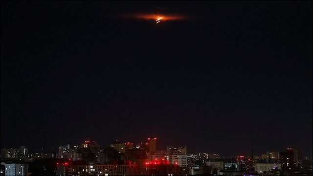 Explosion lights up the sky over the city during a Russian drone. (Reuters)