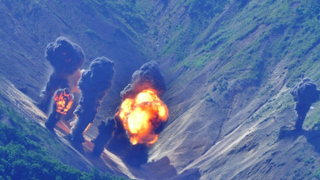 Bombs hitting a mock target at a shooting range in Gangwon Province, east of Seoul, during a South Korea-US joint military drill. (AFP file photo)