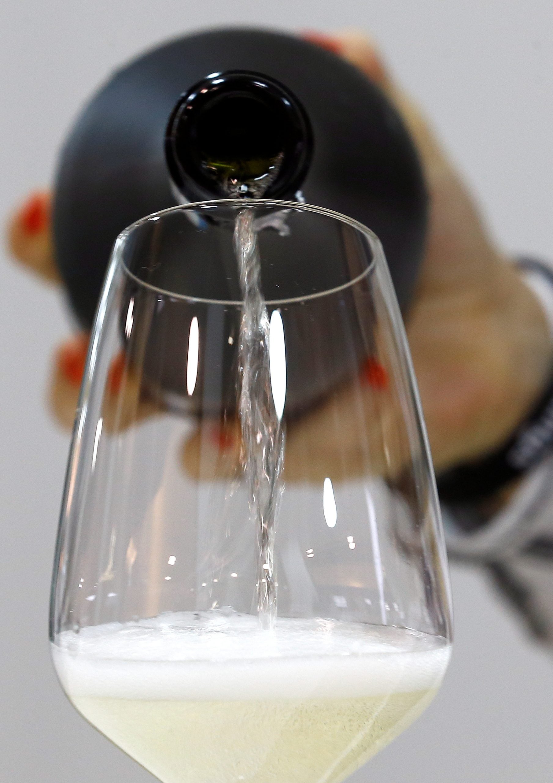 A sommelier pours a glass of Zonin prosecco sparkling wine at the 50th Vinitaly international wine and spirits exhibition in Verona, northern Italy. (IMAGE: REUTERS) A sommelier pours a glass of Zonin prosecco sparkling wine at the 50th Vinitaly international wine and spirits exhibition in Verona, northern Italy. (IMAGE: REUTERS)
