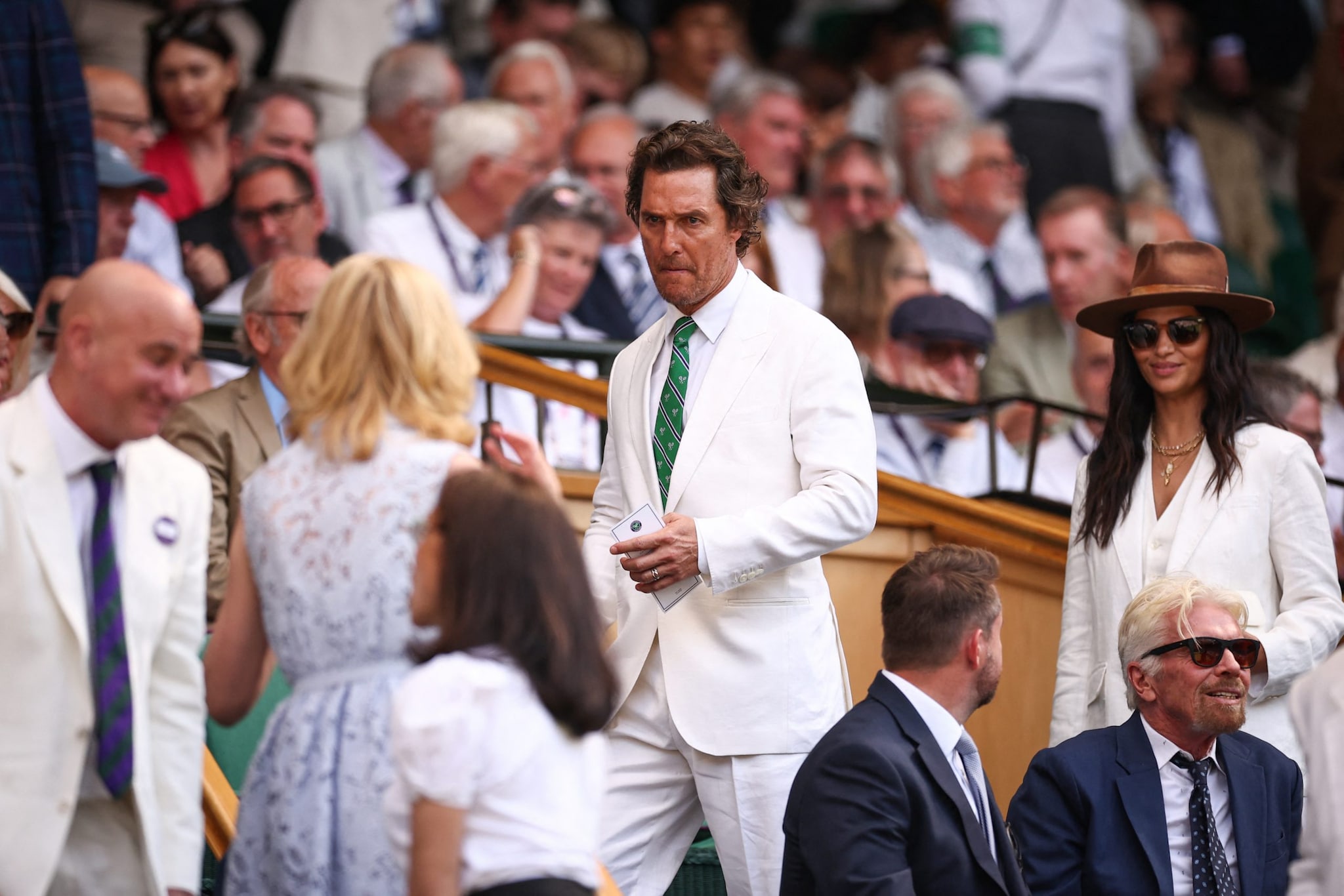 Elsewhere on Centre Court, actor Matthew McConaughey and wife Camila Alves were gearing up for the action (AFP) Elsewhere on Centre Court, actor Matthew McConaughey and wife Camila Alves were gearing up for the action (AFP)
