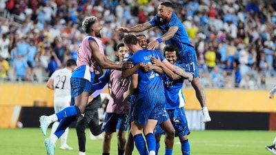 Al Hilal players celebrate following their victory over Manchester City. (AP Photo)