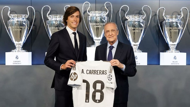 Alvaro Carreras with Real Madrid president Florentino Perez (X)